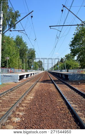Suburban Station On The Double-track Railway At A Summer