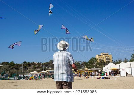 Cervia, Italy, April 2018: Many Colorful Kites In Different Shapes At Cervia International Kite Fest