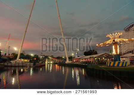 Orlando, Florida.  November 21, 2018 Colorful Attractions In Fun Spot Park On Beautiful Sunset Backg