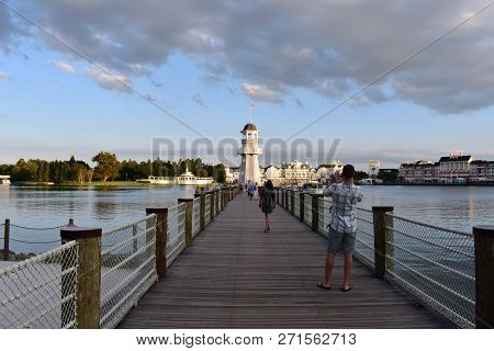 Orlando, Florida. November 15, 2018 Man Take A Picture Of Lighthouse Panoramic View And Boardwalk At