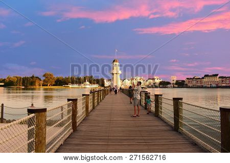 Orlando, Florida. November 15, 2018 Panoramic Vie Of Lighthouse And Pier On Beautiful Sunset Sky Bac