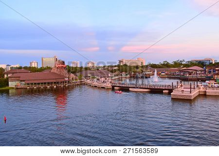 Orlando, Florida. November 19, 2018 Panoramic View Of Volcano Reflecting In Lake, Vintage Bridge And