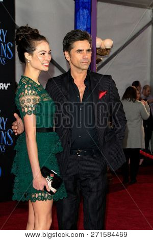 LOS ANGELES - NOV 29:  Caitlin McHugh, John Stamos at the 