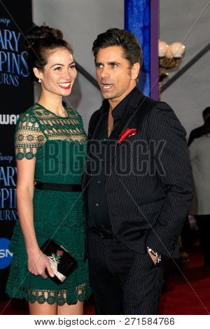 LOS ANGELES - NOV 29:  Caitlin McHugh, John Stamos at the 