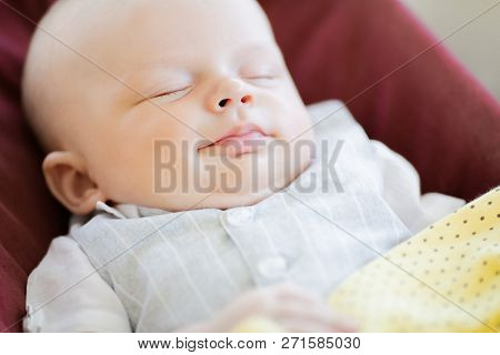 Adorable Qute Smiling Sleeping Newborn Baby. Close-up.