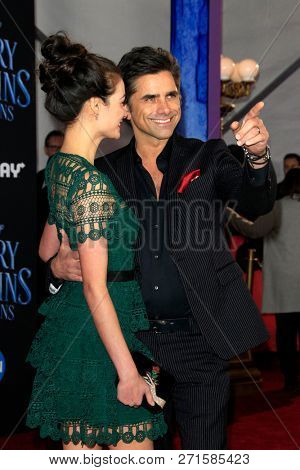 LOS ANGELES - NOV 29:  Caitlin McHugh, John Stamos at the 