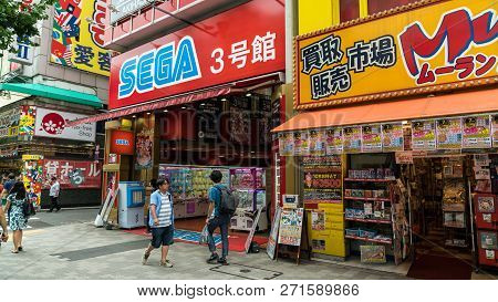 Tokyo, Japan - August 2018: Akihabara Crosswalk Junction In The Evening With Colorful Lights. Japane