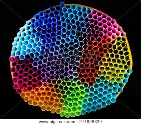 Colorful plastic drinking straws, close up as background