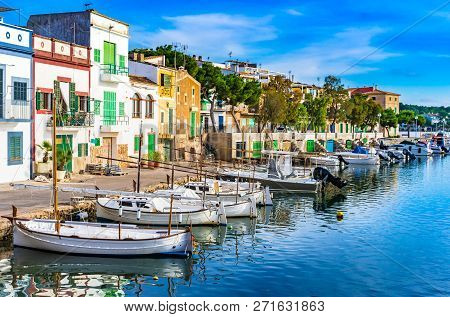 View Of Porto Colom Harbour With Colorful Houses On Majorca, Spain Balearic Islands
