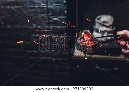 Shisha Hookah With Red Hot Coals. Sparks From Breathe. Modern Hookah With Coconut Charcoal For Relax