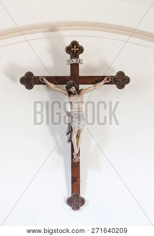 Statue Of Jesus Christ At The Holy Cross, Hanging On A Wall
