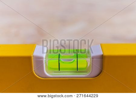 Close Up Photo Of A Leveling Tool Bubble Level Being Used