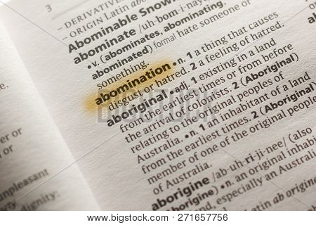 The Word Or Phrase Abomination In A Dictionary Highlighted With Marker.