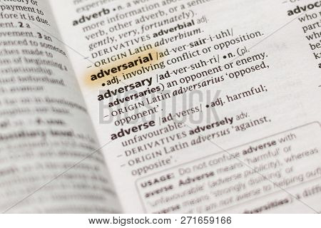 The Word Or Phrase Adversarial In A Dictionary Highlighted With Marker.