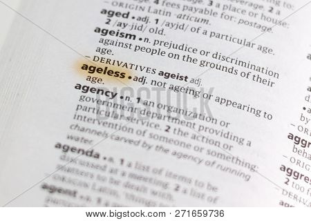 The Word Or Phrase Ageless In A Dictionary Highlighted With Marker.