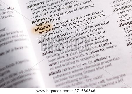 The Word Or Phrase Aliquot In A Dictionary Highlighted With Marker.