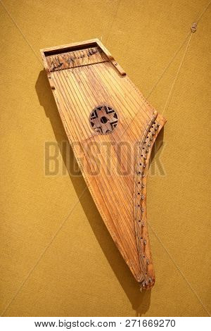 Kokles Latvian String Instrument Hanging On Wall