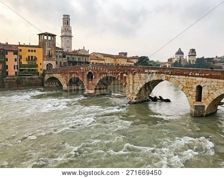 View Of The Old Historical Stone Bridge Ponte Pietra And Adige River In Center Of The City Verona. I