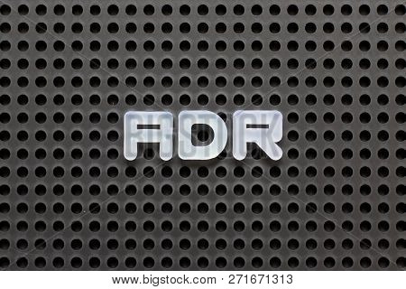 Black Color Pegboard With White Letter In Word Adr (abbreviation Of Adverse Drug Reaction)
