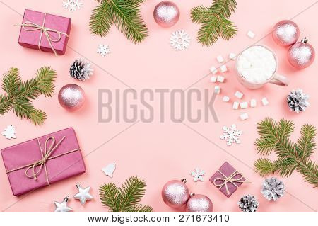 Christmas Background With Fir Branches, Lights, Purple Giftboxes, Pink Decorations, Hot Drink With M