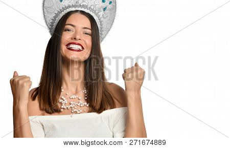 Happy Successful Young Woman Un Russian Traditional Cap Kokoshnik With Raised Hands Shouting And Cel