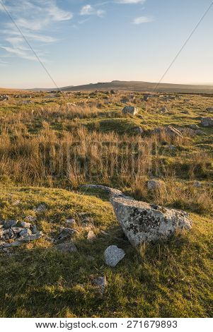 Beautiful Landscape Sunset Image Over Abandoned Foggintor Quarry In Dartmoor With Raking Soft Sunlig