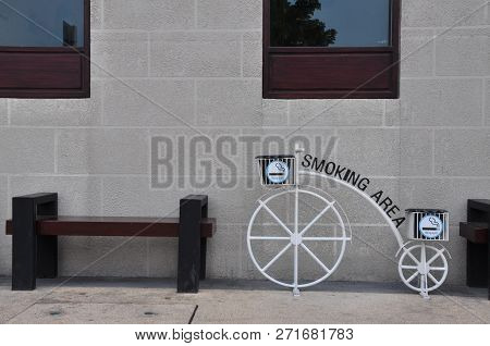 Small Cigarette Butts Are Shaped Like A White Bicycle.