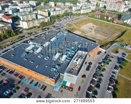 Koszalin, Poland - 13 September 2018 - Aerial view on Shopping Center Emka in north district of Koszalin city, Wladyslawa IV street area.