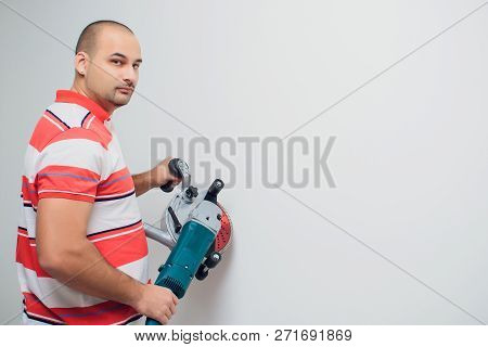 Construction Worker With A Puncher Scream On A White Background.