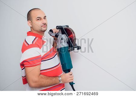 Construction Worker With A Puncher Scream On A White Background.