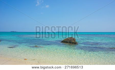 Stone Water On The Beach With Very Blue And Clear Sky On Karimun Jawa Island Indonesia