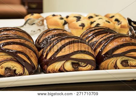 Flakey Chocolate Croissant Grouped On A Plate In A Bakery Fresh From The Oven With Homemade Chocolat