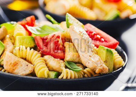 Tasty Fresh Made Italian Pasta Salad With Fusilli Al Bronzo, Tomatoes, Avocado, Spinach, Chicken And
