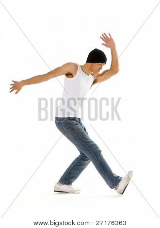 Urban style street breakdancing handstand grab move done isolated on white in studio