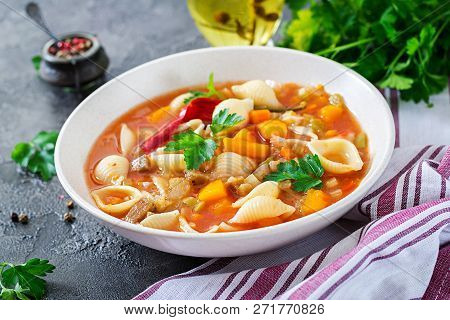 Minestrone, Italian Vegetable Soup With Pasta On  Table. Vegan Food