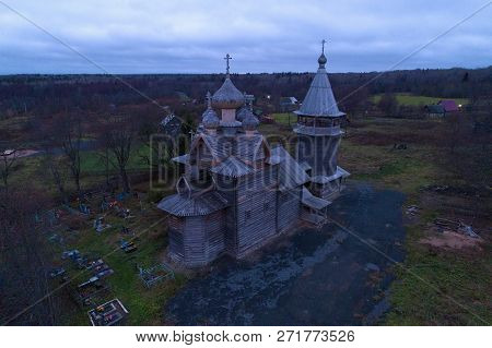 The Ancient Wooden Church Of Dmitry Solunsky In November Twilight (shooting From A Quadcopter). Vill