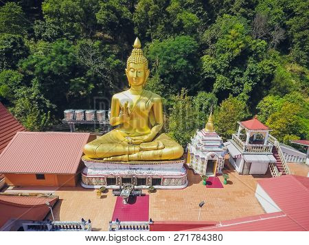Golden Statue Sitting Buddha, Wat Khao Rang Samakkhitham, Phuket, Thailand
