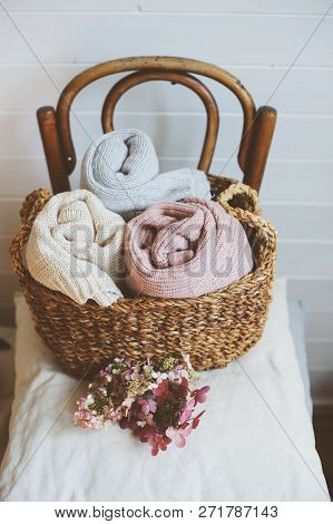 Cozy Still Life Interior Details. Organizing Clothes In Wicker Backets, Seasonal Wardrobe Cleaning, 