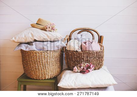 Cozy Still Life Interior Details. Organizing Clothes In Wicker Backets, Seasonal Wardrobe Cleaning, 