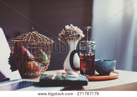 Relaxing At Home In Cozy Weekend Morning. Beautiful Interior Details With Hot Tea, Notes And Flowers