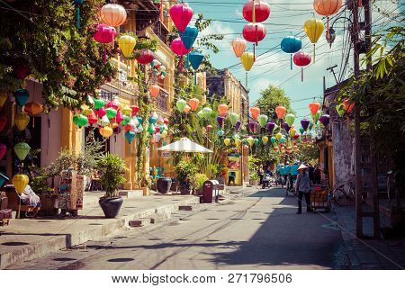 Hoi An, Vietnam - November 21, 2018: Hoian Ancient Town Houses. Colourful Buildings With Festive Sil