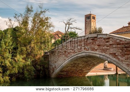 Bridge In Front Of The Church Of Santa Maria Assunta On The Island Of Torcello