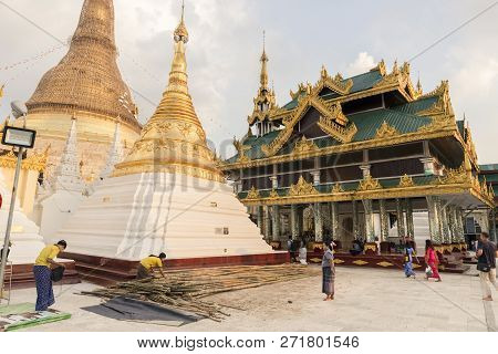 Yangon, Myanmar - 16 November, 2018: Horizontal Picture Of Local People Working At Shwedagon Pagoda,
