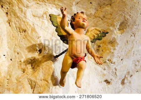 Sassi Di Matera. Little Angel Or Putto. Part Of The Decorations Of A Residential Cave.. Basilicata, 