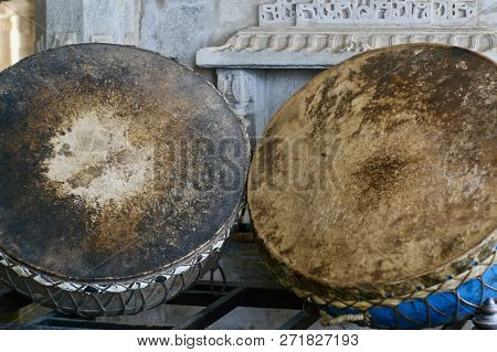 Two Giant Old Drums Worn From Drumming Over Time