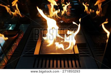 Exploding Flames Black Background. Fireplace With Just Like Fire. Burning In The Fireplace In The Co