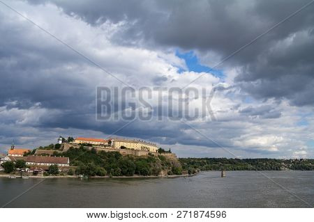 Petrovaradin Fortress In Novi Sad, Serbia, On Danube River, On A Cloudy Summer Afternoon. It Is One 