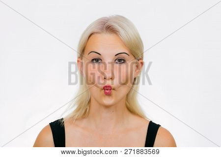 Face Exercise Fish Face, Woman Makes Fish Face, Girl Sucks In Her Cheeks