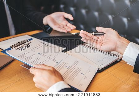 Employee Young Man Explaining About His Profile Resume To Senior Manager During Job Interview Concep