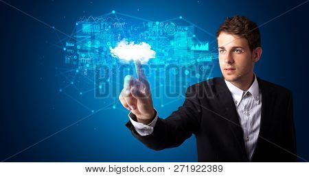 Man touching hologram projection displaying information from cloud based system